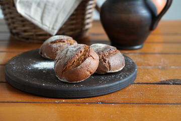Homemade rye bread. Buns on the kitchen table