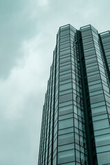 Skyscraper Towering Against a Clear Blue Sky