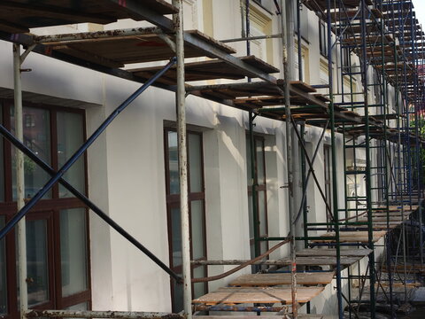 scaffolding near the building wall during restoration