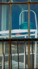 Old and Worn Items Stored on a Closed Balcony
