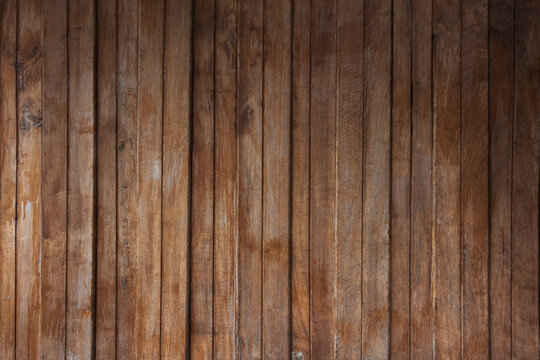 Grunge wood panel vertical with empty space for background.