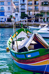Fototapeta na wymiar Mediterranean traditional colorful boats luzzu. In Malta.