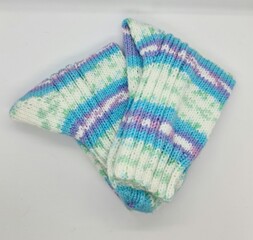 A pair of colorful knitted socks