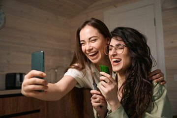 Young women preparing food and take pictures