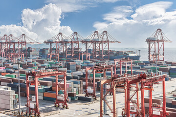 Fototapeta na wymiar Busy container ports and beautiful nature in China
