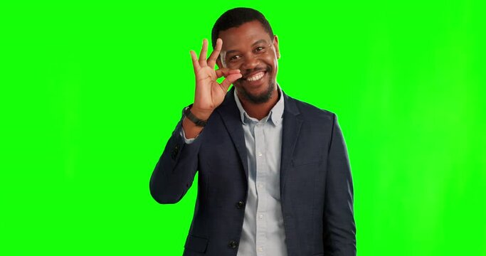 Okay sign, business and happy black man on green screen for support, agreement and success. Excited, studio and portrait of male entrepreneur with approval hand gesture for promotion, like or perfect