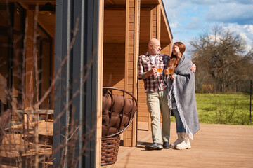 Male spending time with beloved woman in countryside