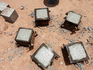 Cube concrete casting by steel cube molds for compressive strength test - obrazy, fototapety, plakaty