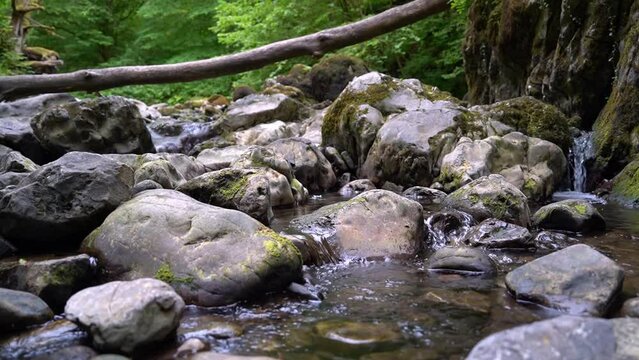 The Pwll y Berw River near The Sychryd Cascades or Sgydau Sychryd Falls in Waterfall Country near the Dinas Rock, Brecon Beacons National Park, South Wales, UK. Slow motion water calming footage.