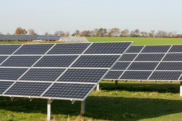 Solar panels on a field, collecting energy