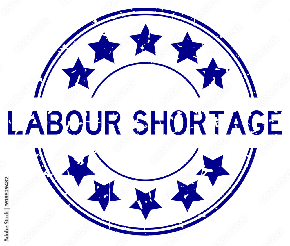 Wall mural Grunge blue labour shortage word with star icon round rubber seal stamp on white background