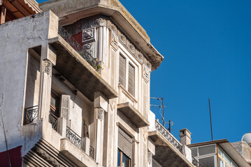 Fototapeta na wymiar Old derelict Art Deco houses in the Ville Nouvelle of Casablanca