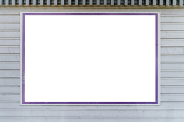Empty white billboard with violet border on a wall.