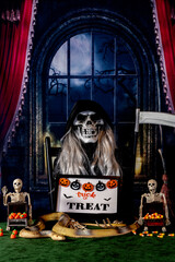 Vertical Halloween grim reaper ready for trick or treat