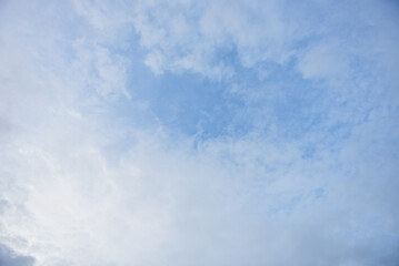 Blue sky and tiny white clouds for background.
