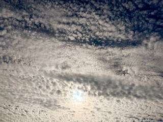 white fluffy clouds in the blue sky