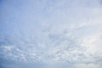 Blue sky and tiny white clouds for background.