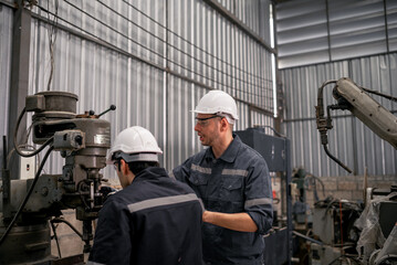 Fototapeta na wymiar Robotic technicians perform regular maintenance by inspecting, testing, and repairing machinery and engines to ensure they stay in standard condition.Recording and reporting damaged, incomplete items