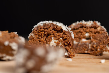 Chocolate candies with coconut flavor and filling