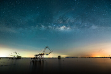 Milky way with square dip net in lake at Pakpra village, Phatthalung, Thailand