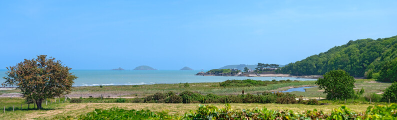 panoramic view from the former abbey Notre-Dame de Beauporte in the village of Paimpol in Brittany onto the atlantic ocean, France