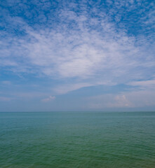 Panorama front view landscape Blue sea rock and sky blue background morning day look calm summer Nature tropical sea Beautiful ocen water travel Bangsaen Beach East thailand Chonburi Exotic horizon.