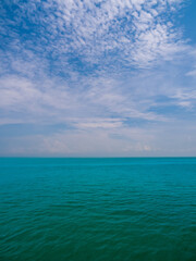 Vertical view Blue sea blue background look calm landscape viewpoint summer Nature tropical sea Beautiful  ocean water Bangsaen Beach East thailand Chonburi Exotic horizon.