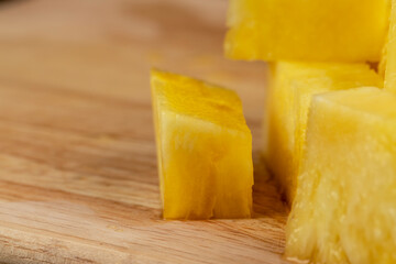Sliced delicious ripe pineapple yellow, close up