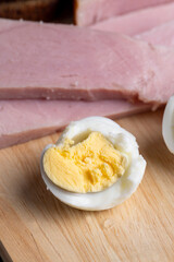 Boiled chicken egg with sliced pieces of meat