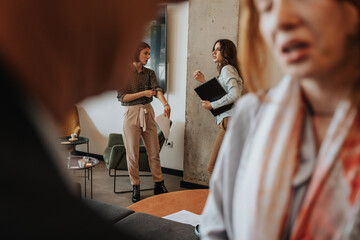 Two worried business girls having a conversation after the meeting about the project went bad
