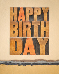 happy birthday greeting card - text in vintage letterpress wood type against art paper