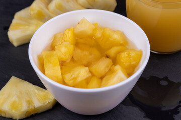 pieces of canned ripe yellow pineapple, canned pineapple