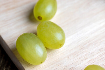 Green yellow grapes grown in a home vineyard