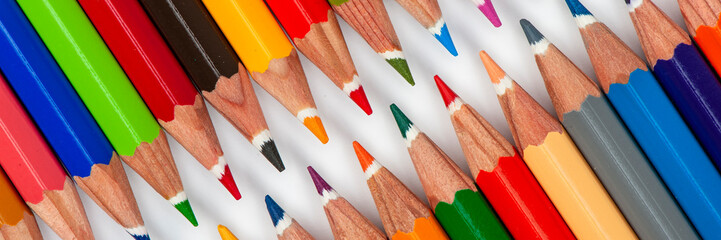Colored pencils arranged as a symbol for teamwork and community
