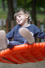 child is playing on the playground in varna bulgaria 