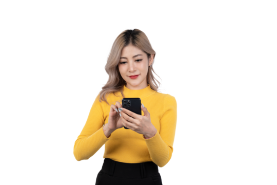 Portrait of a happy asian businesswoman using mobile phone isolated over white background.