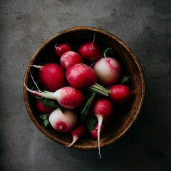 Overhead view of a bowl of radishes