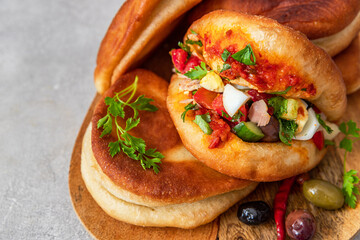 Fricasse is a savory donut filled tuna, potato,boiled egg, olives and harissa.Traditional Tunisian...