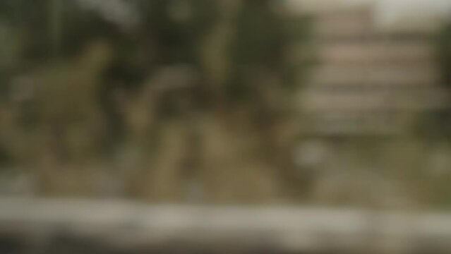 Blurred background of cities of French Riviera sideview from a train