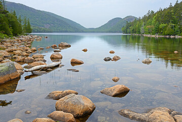 Jordan Pond, one of park's most pristine lakes. Glaciers carved landscape, leaving behind numerous geological features. Acadia National Park, Maine, United States