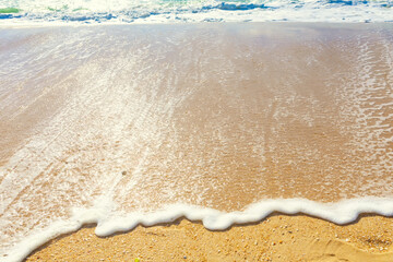 sea tide waves with white foam