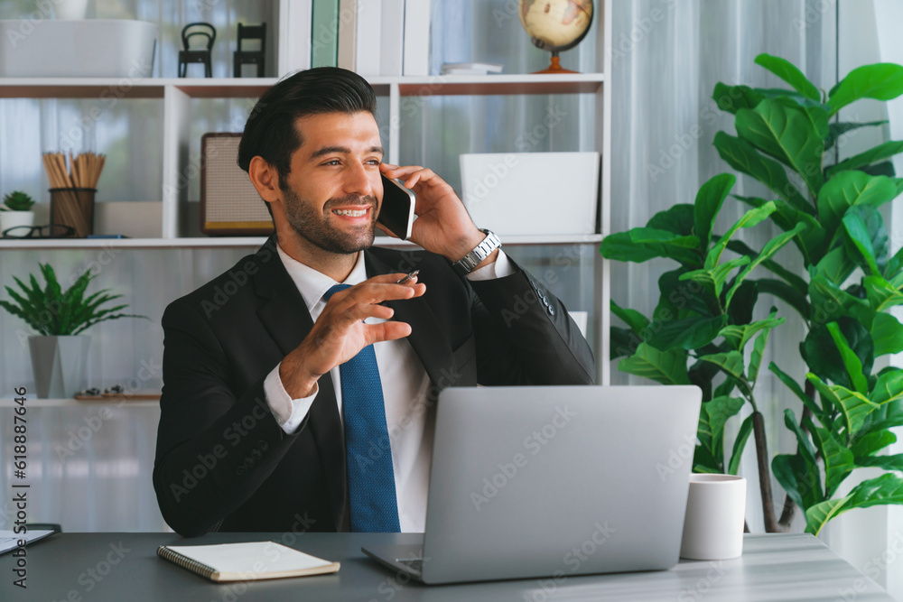 Aufkleber diligent businessman busy talking on the phone call with clients while working with laptop in his of