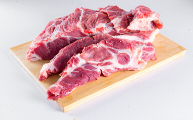 Fresh pork on a white table