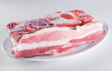 Fresh pork on a white table