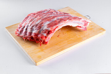 Fresh pork on a white table