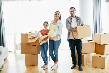 Fototapeta na wymiar child family box home house moving happy apartment pregnant mother father daughter relocation new property parent pregnancy