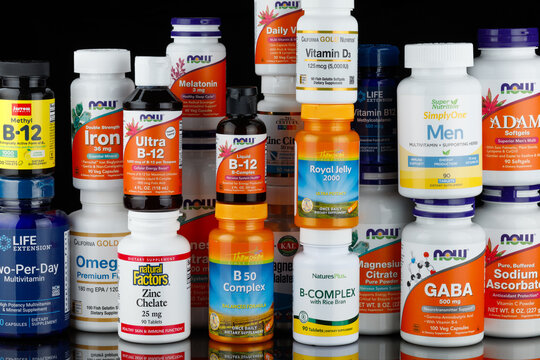 LVIV, UKRAINE - June 29, 2023: Dietary supplements, vitamins and minerals in jars