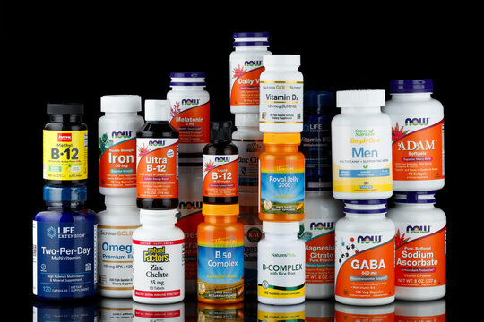 LVIV, UKRAINE - June 29, 2023: Dietary supplements, vitamins and minerals in jars