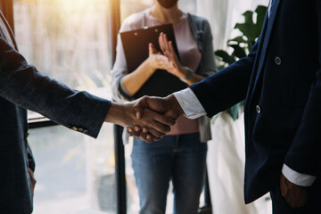 Business handshake for teamwork of business merger and acquisition,successful negotiate,hand...