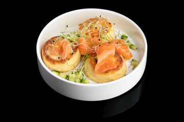 Salted cottage cheese pancake with smoked salmon slices